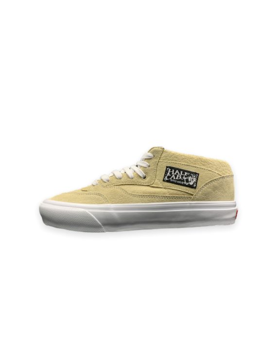 Chaussure de skate de la marque vans coupe semi montante couleur beige