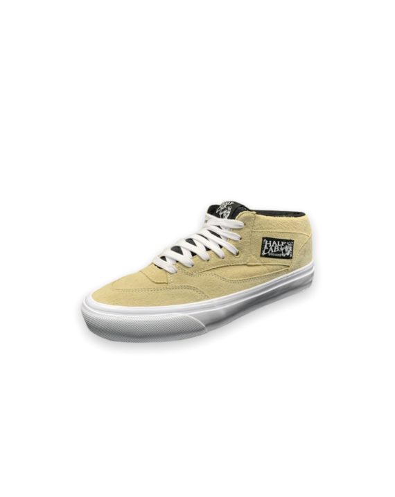 Chaussure de skate de la marque vans coupe semi montante couleur beige