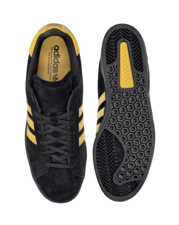 chaussure de skate de la marque adidas couleur noir et jaune